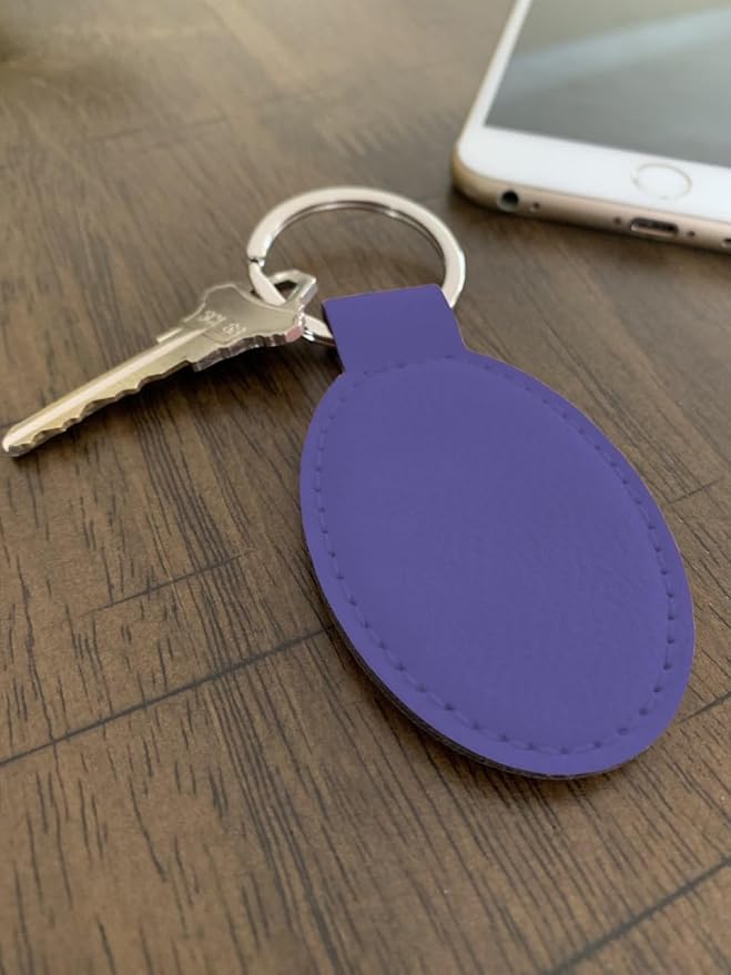 LaserGram Oval Keychain, Golfer Golfing, Personalized Engraving Included (Dark Purple)