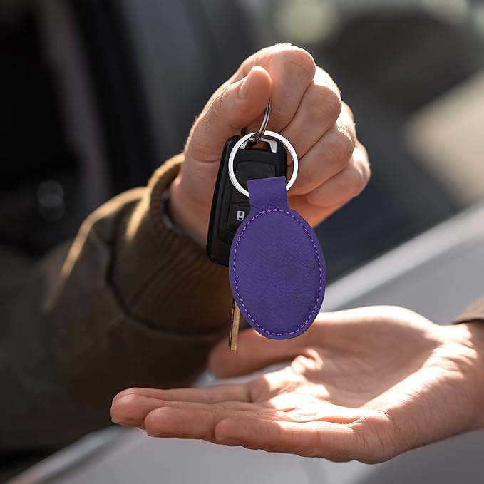 LaserGram Oval Keychain, Golfer Golfing, Personalized Engraving Included (Dark Purple)