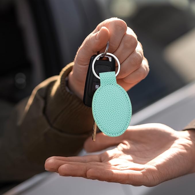 LaserGram Oval Keychain, Golfer Golfing, Personalized Engraving Included (Basketball Teal)