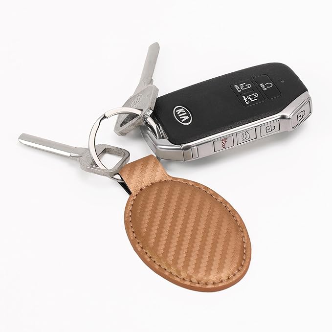 LaserGram Oval Keychain, Golfer Golfing, Personalized Engraving Included (Carbon Fiber Bronze)
