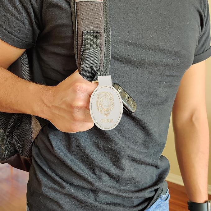 LaserGram Oval Keychain, Golfer Golfing, Personalized Engraving Included (White with Gold)