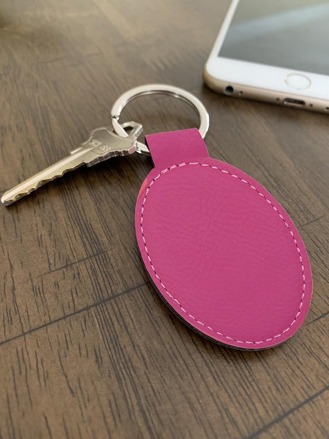 LaserGram Oval Keychain, Golfer Golfing, Personalized Engraving Included (Hot Pink)