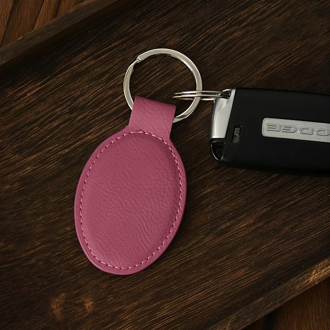 LaserGram Oval Keychain, Golfer Golfing, Personalized Engraving Included (Pink)