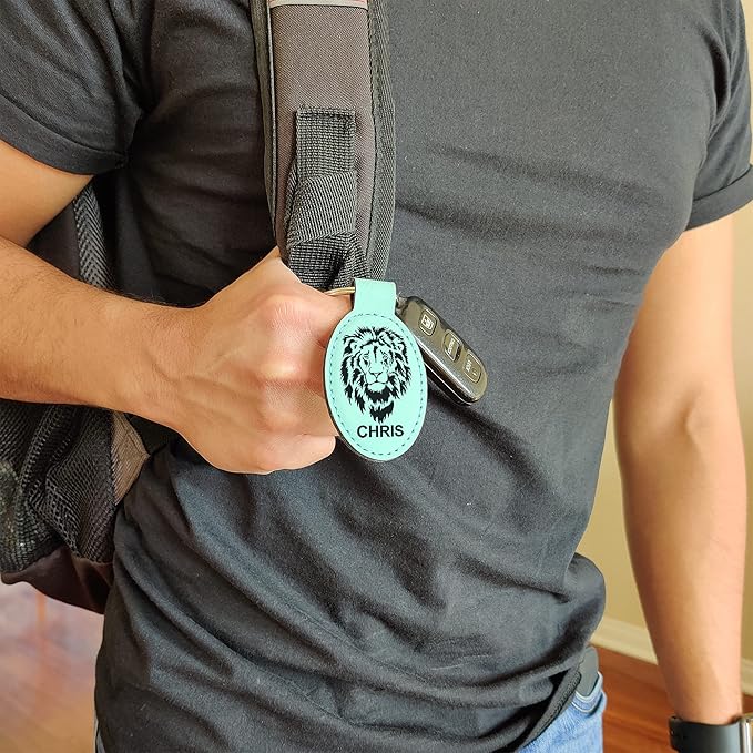 LaserGram Oval Keychain, Golfer Golfing, Personalized Engraving Included (Teal)