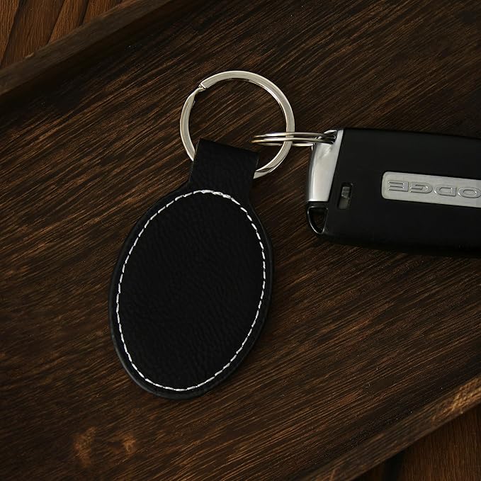 LaserGram Oval Keychain, Golfer Golfing, Personalized Engraving Included (Black with Silver)