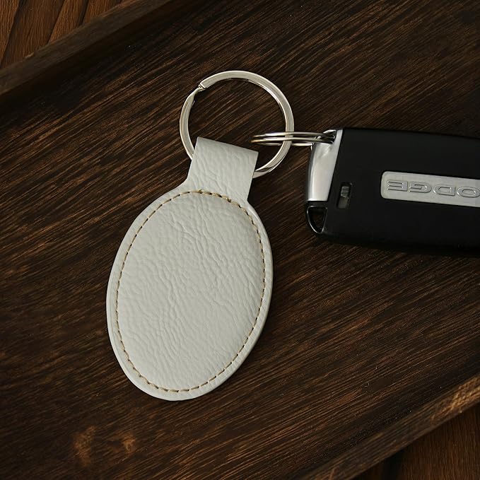 LaserGram Oval Keychain, Golfer Golfing, Personalized Engraving Included (White with Gold)